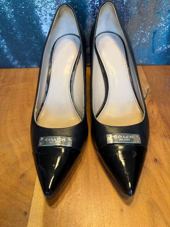 Coach Shoes - Coach Black Pointed Toe Leather Pumps with Silver Logo Plate